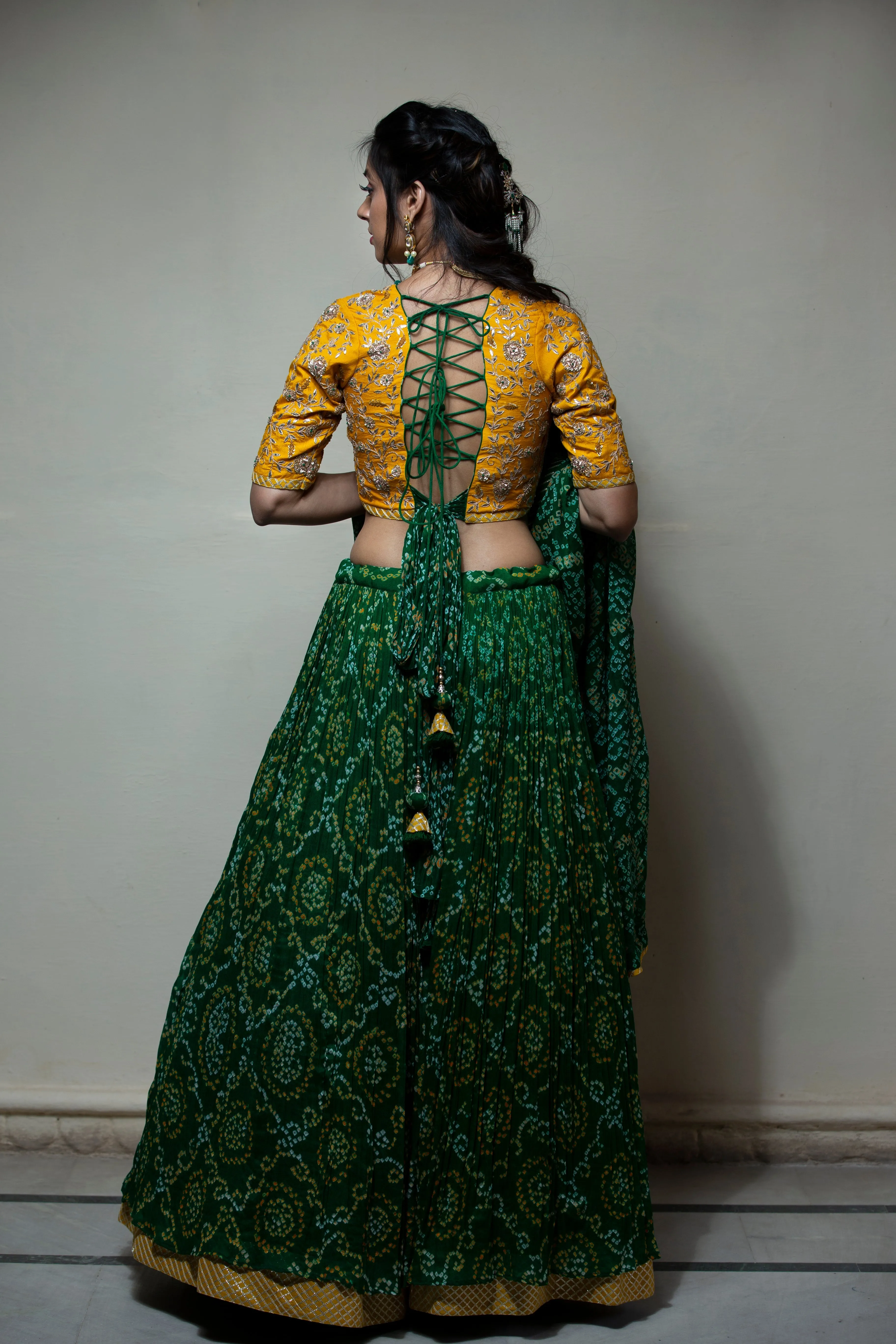 Bandhej Chinon silk Lehenga with Aari, Gota Patti, Sequins, Thread, Zardozi work.