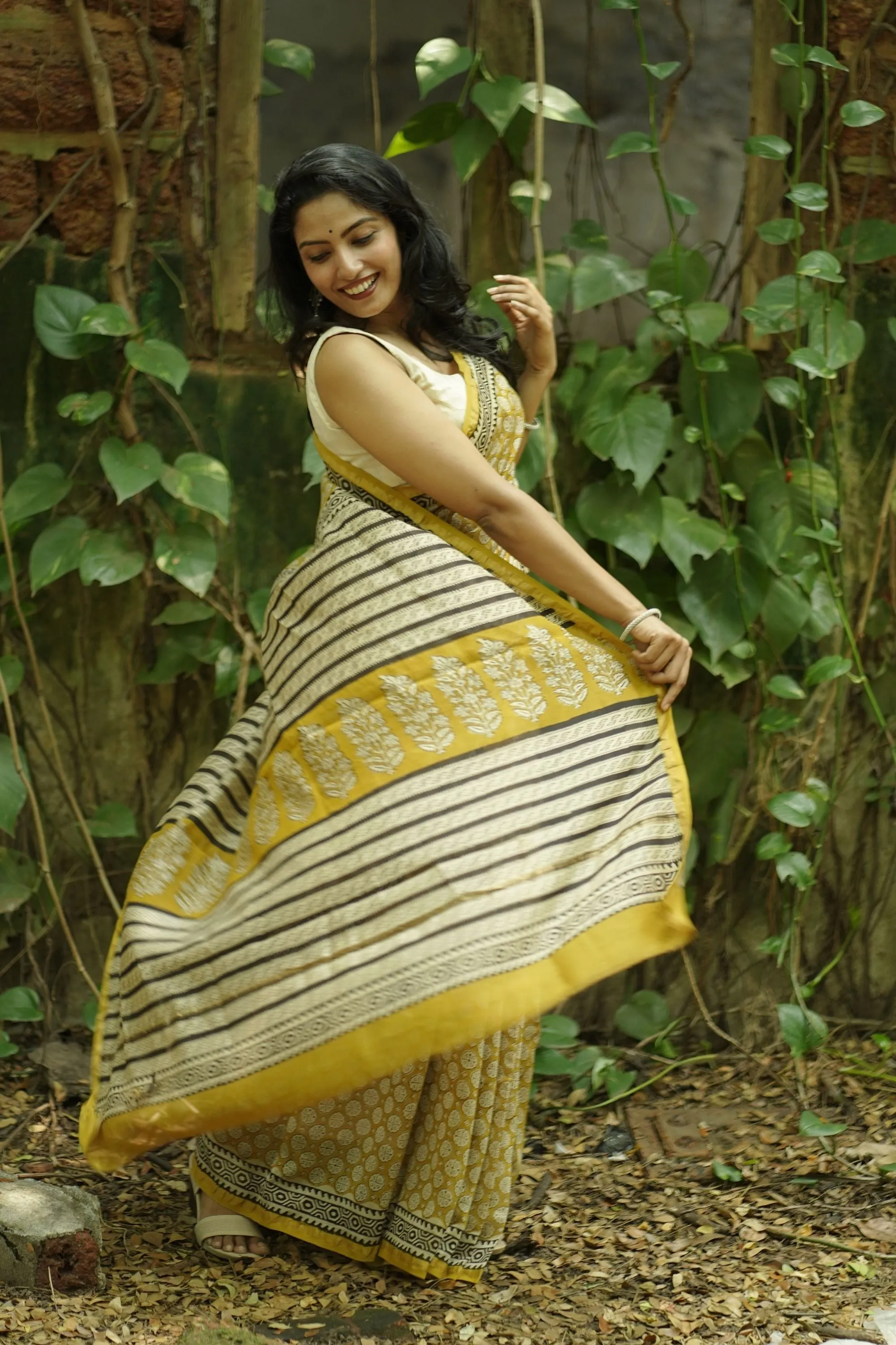 Roheda Bagru Syahi Begar yellow black silk cotton saree