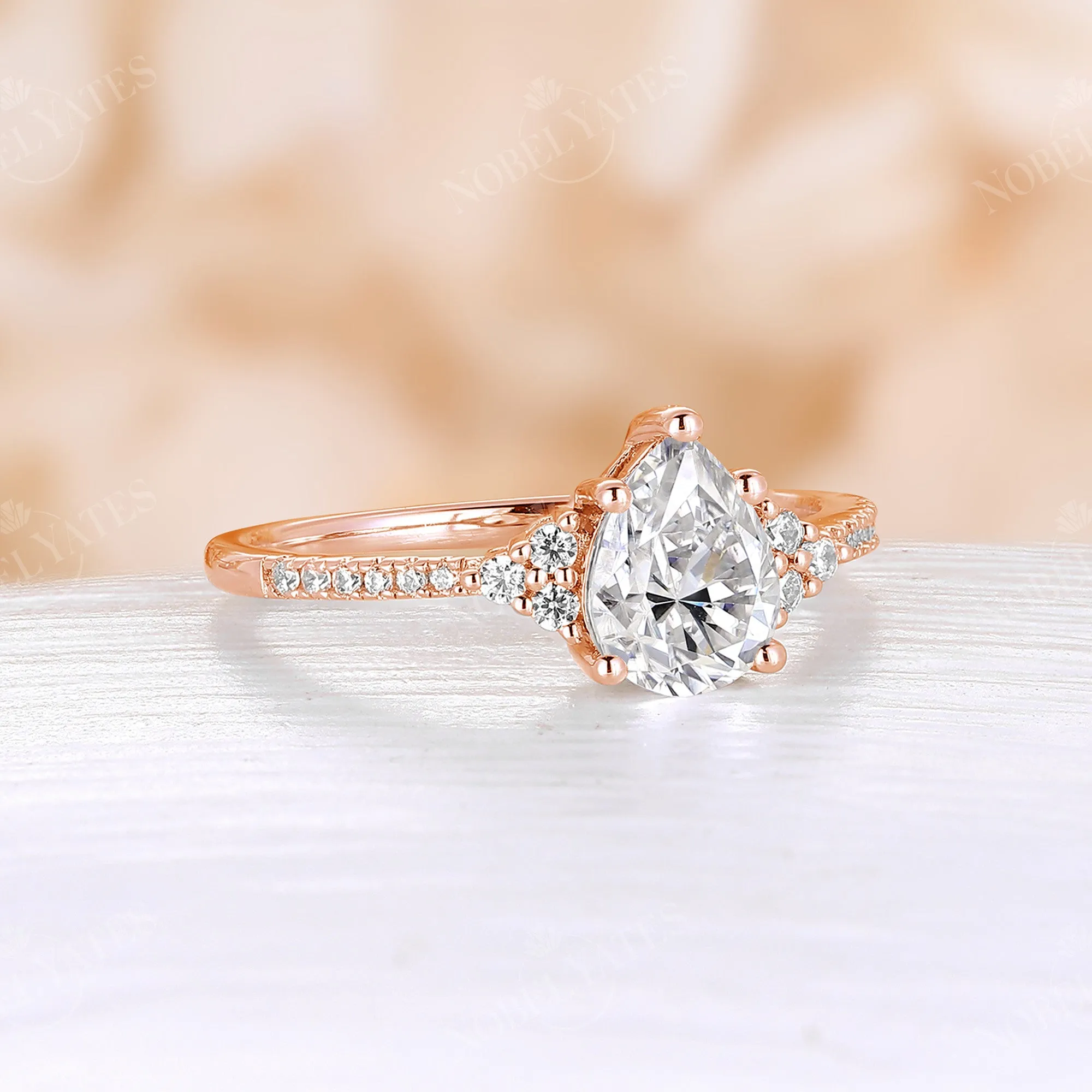 Vintage Pear Moissanite Rose Gold Pave & Cluster Engagement Ring