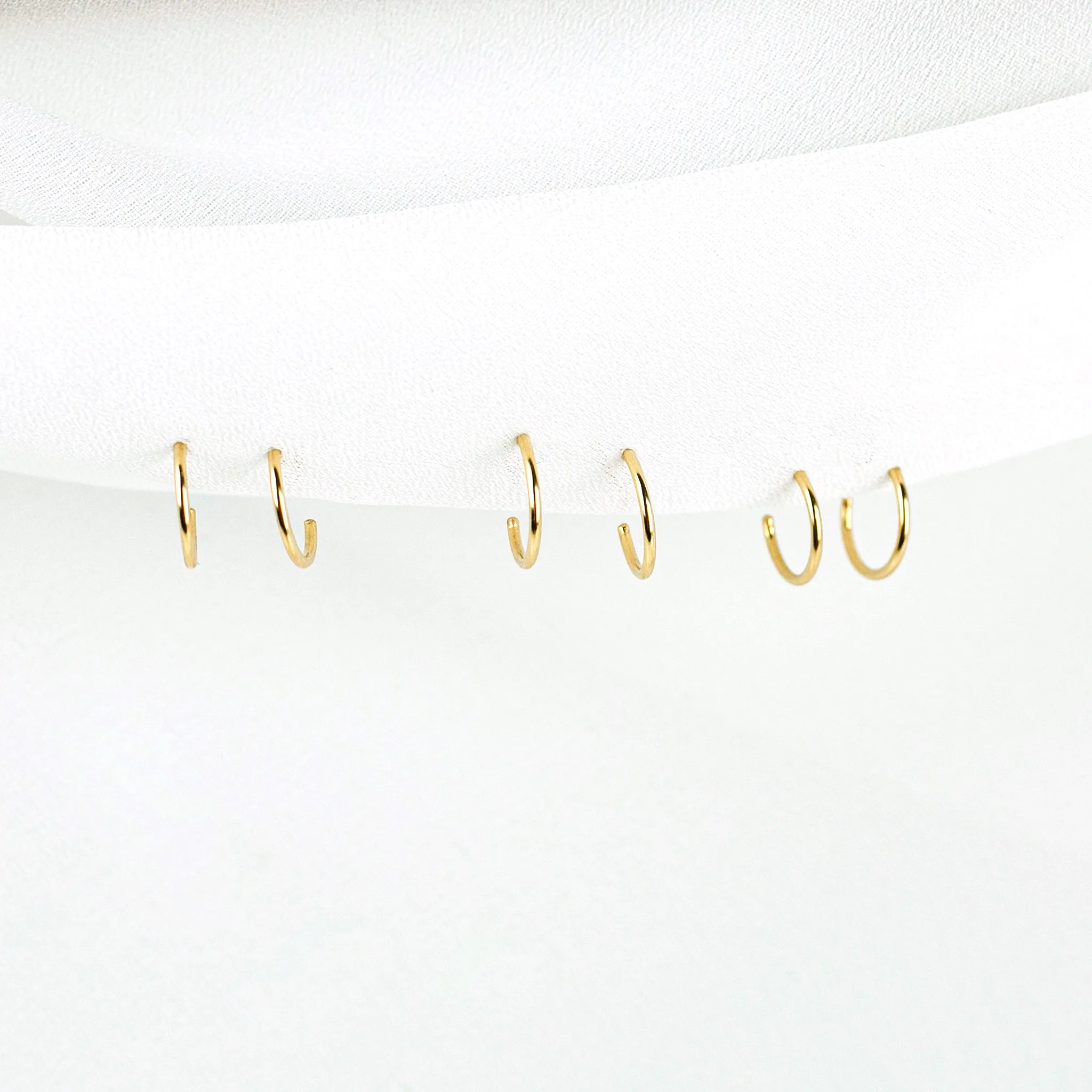 Weightless Huggie Earrings